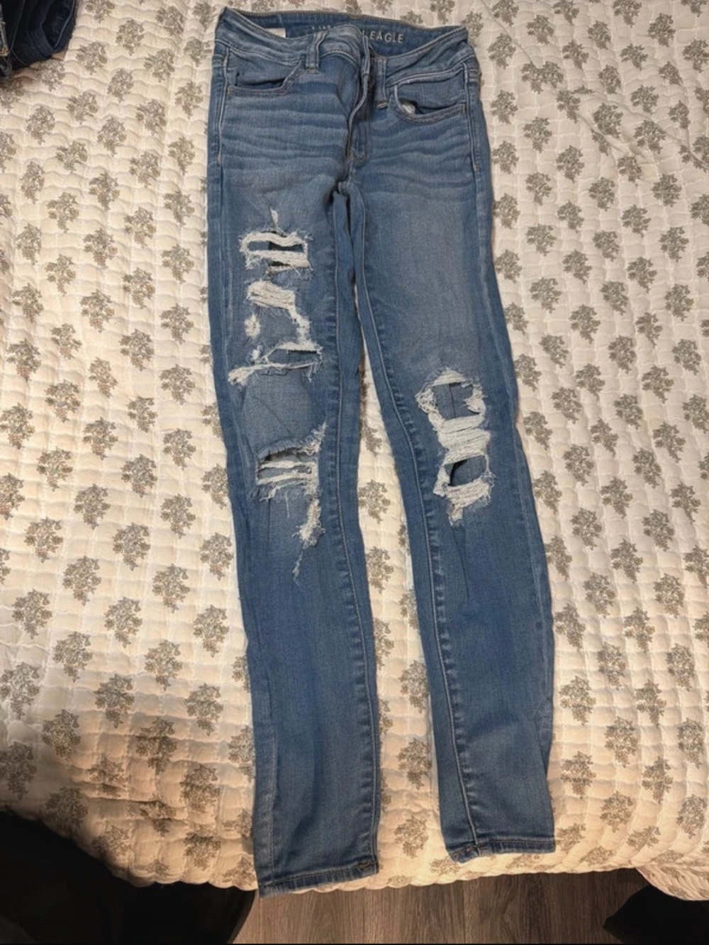 American Eagle Outfitters Light Blue Distressed Skinny Jeggings